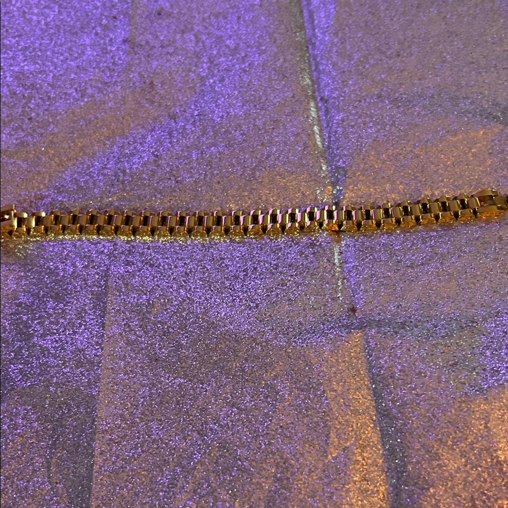 Gold Chain Bracelet Resembles a Rolex Watch band.